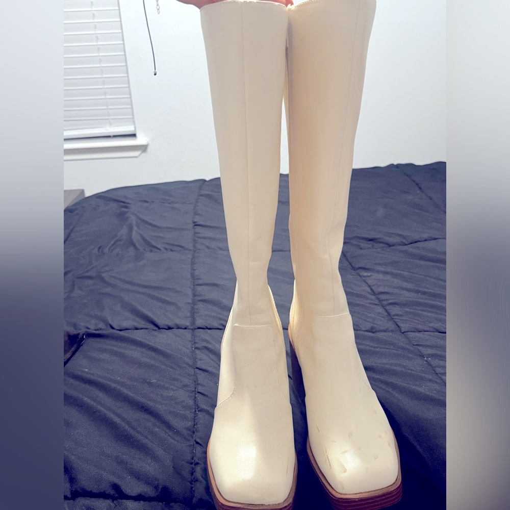Long white boots